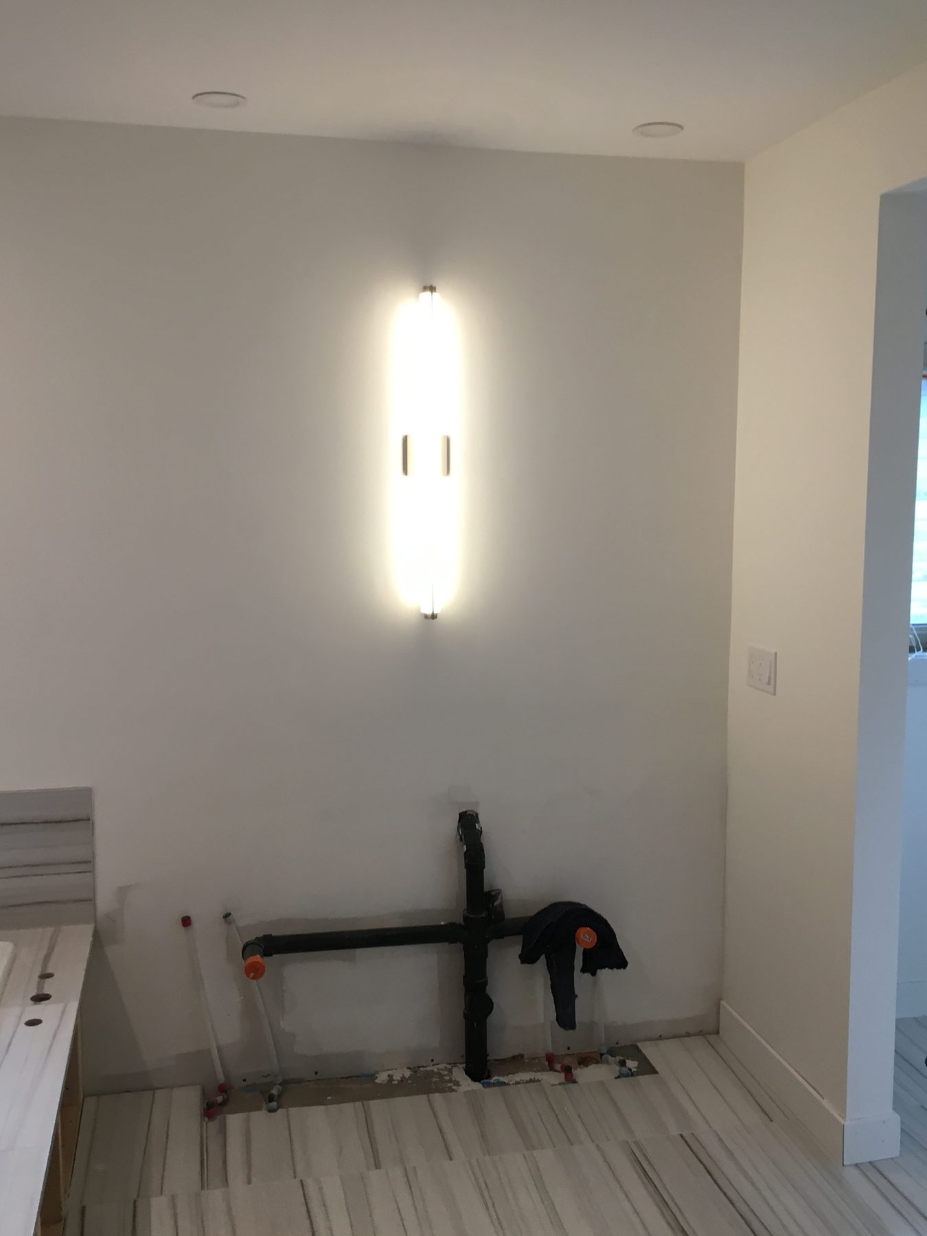 Wall light fixture installation